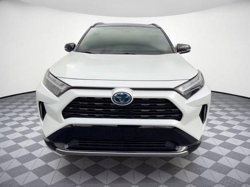 Wind Chill Pearl/Midnight Black Metallic 2023 Toyota RAV4 Hybrid SE