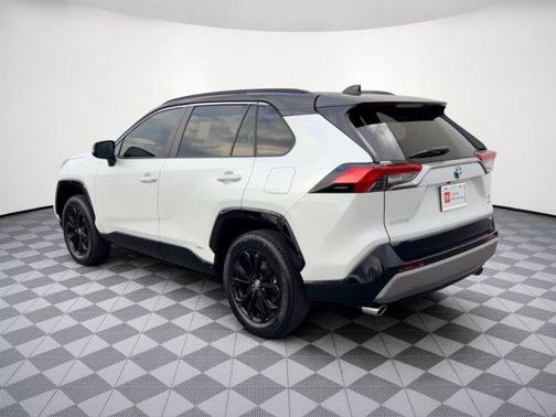 Wind Chill Pearl/Midnight Black Metallic 2023 Toyota RAV4 Hybrid SE