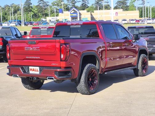 Volcanic Red Tintcoat 2024 GMC Sierra 1500 AT4