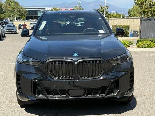 Black Sapphire Metallic 2026 BMW X5 PHEV xDrive50e