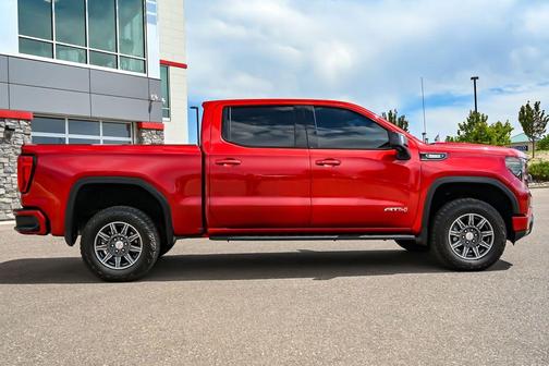 Volcanic Red 2024 GMC Sierra 1500 AT4