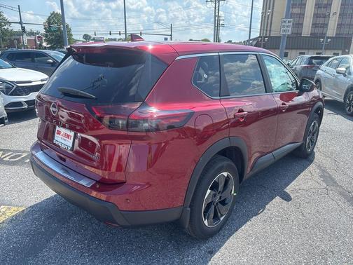 Scarlet Ember Tintcoat 2026 Nissan Rogue SV