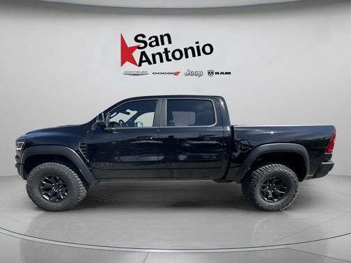 Diamond Black Crystal Pearlcoat 2026 RAM 1500 RHO Crew Cab 4x4 5'7' Box