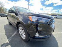 AGATE BLACK METALLIC 2024 Ford Edge Titanium
