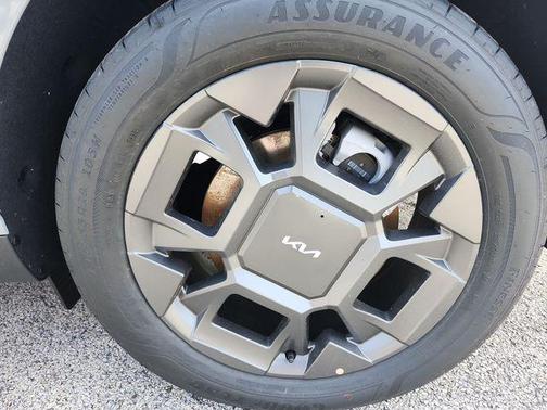 Ceramic Silver 2026 Kia Carnival Hybrid EX