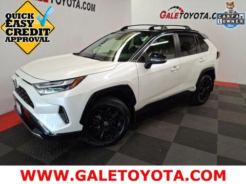 Blizzard Pearl/Midnight Black Metallic 2022 Toyota RAV4 Hybrid SE