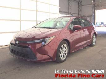Red 2024 Toyota Corolla LE