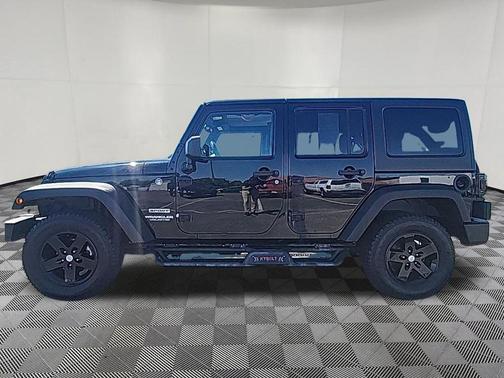 Black Clearcoat 2012 Jeep Wrangler Unlimited Sport