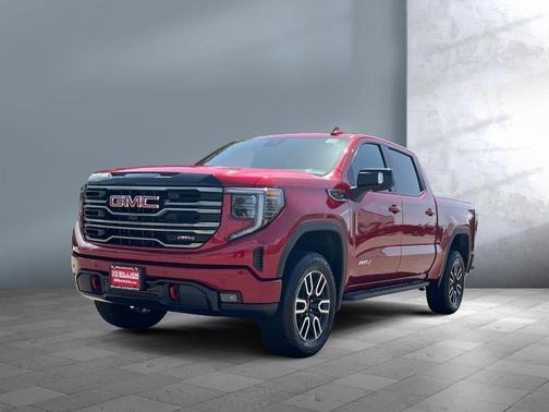 Volcanic Red Tintcoat 2026 GMC Sierra 1500 AT4