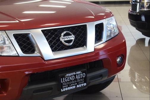 Lava Red 2015 Nissan Frontier Desert Runner