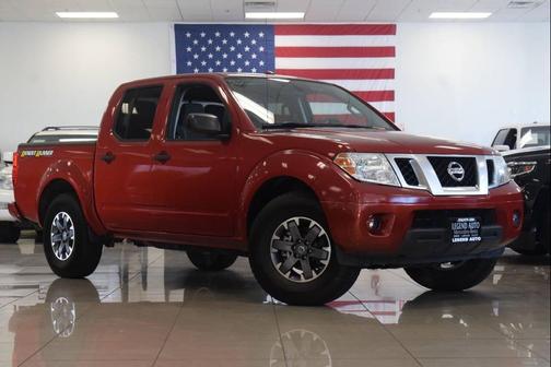 Lava Red 2015 Nissan Frontier Desert Runner