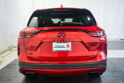 Dynamic Sunstone Red 2024 INFINITI QX50 SPORT AWD