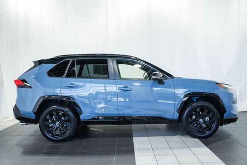 Cavalry Blue/Midnight Black Metallic 2024 Toyota RAV4 Hybrid SE