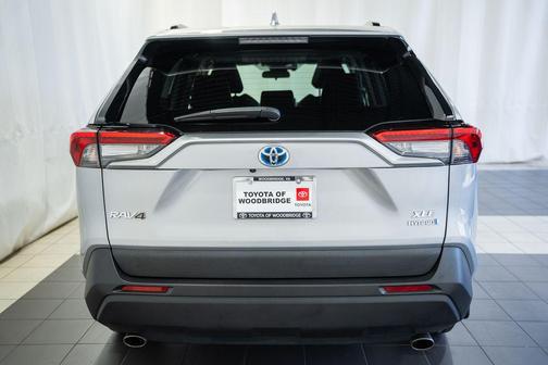 Silver Sky Metallic 2024 Toyota RAV4 Hybrid XLE Premium