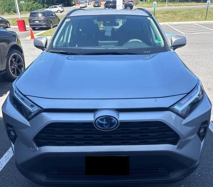 Silver Sky Metallic 2024 Toyota RAV4 Hybrid XLE Premium