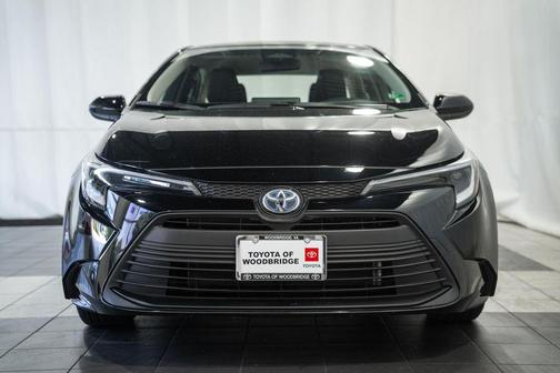 Midnight Black Metallic 2025 Toyota Corolla Hybrid LE