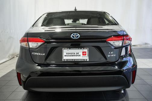 Midnight Black Metallic 2025 Toyota Corolla Hybrid LE