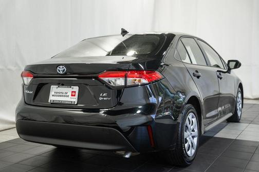 Midnight Black Metallic 2025 Toyota Corolla Hybrid LE