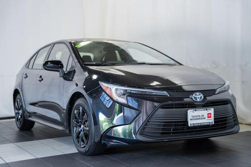 Midnight Black Metallic 2025 Toyota Corolla Hybrid LE
