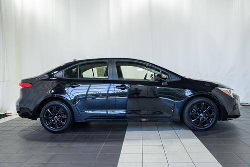 Midnight Black Metallic 2025 Toyota Corolla Hybrid LE