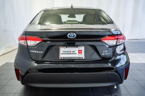Midnight Black Metallic 2025 Toyota Corolla Hybrid LE