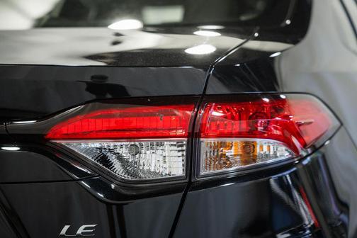 Midnight Black Metallic 2025 Toyota Corolla Hybrid LE