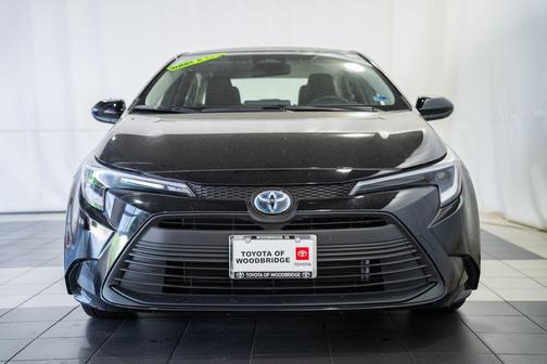 Midnight Black Metallic 2025 Toyota Corolla Hybrid LE