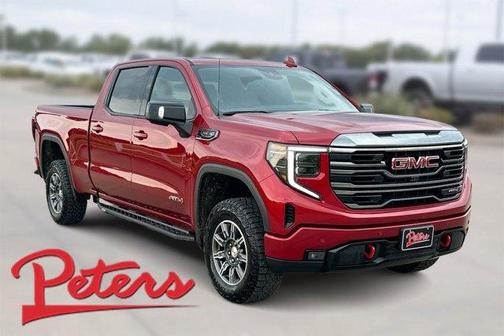 Volcanic Red 2024 GMC Sierra 1500 AT4