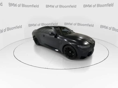 Black Sapphire Metallic 2024 BMW M4 Competition xDrive