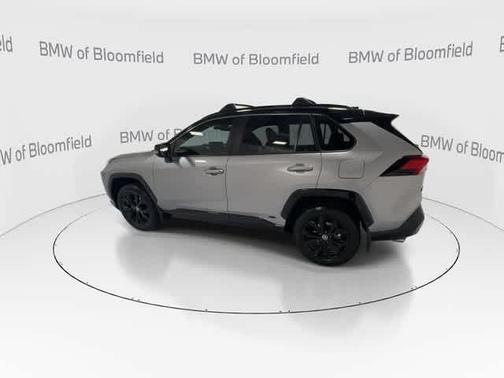Silver Sky Metallic/Midnight Black Metallic 2024 Toyota RAV4 Hybrid SE