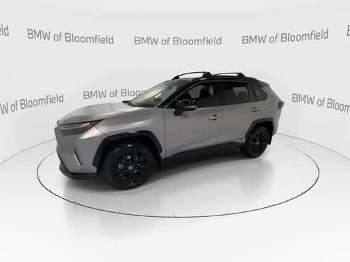 Silver Sky Metallic/Midnight Black Metallic 2024 Toyota RAV4 Hybrid SE