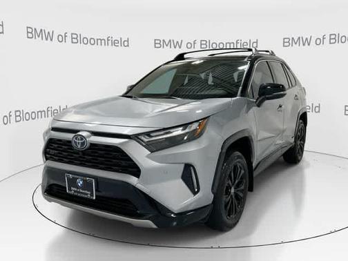 Silver Sky Metallic/Midnight Black Metallic 2024 Toyota RAV4 Hybrid SE