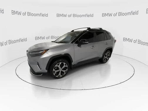 Silver Sky Metallic/Midnight Black Metallic 2025 Toyota RAV4 Hybrid SE