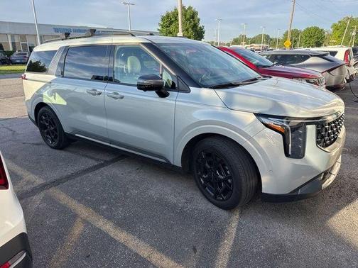 Ivory Silver 2025 Kia Carnival SX Prestige