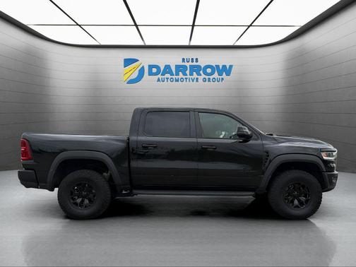 Diamond Black Crystal Pearlcoat 2025 RAM 1500 RHO Crew Cab 4x4 5'7' Box