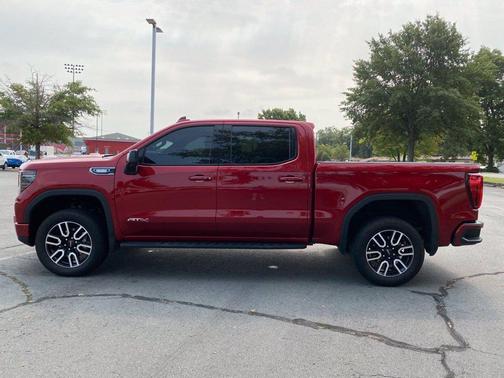 Volcanic Red 2025 GMC Sierra 1500 AT4