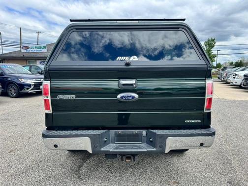 Dark green 2014 Ford F-150 XLT