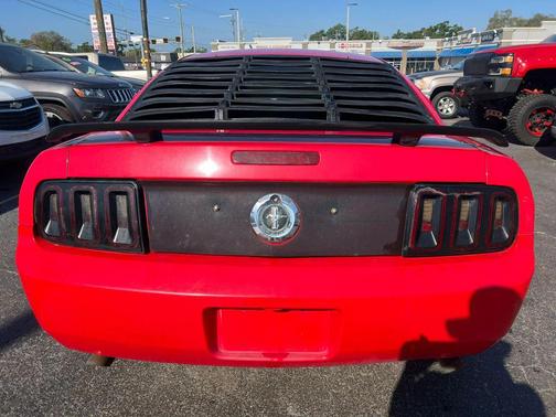 Red 2006 Ford Mustang Deluxe