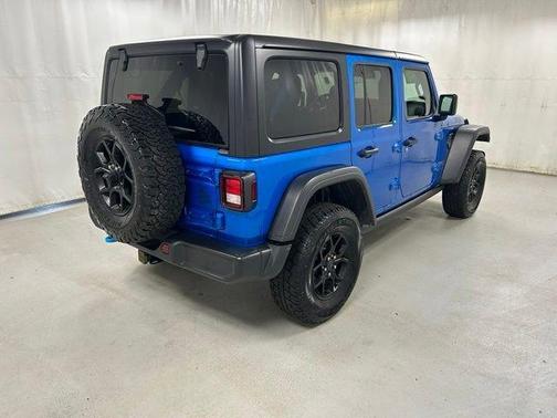 Blue 2024 Jeep Wrangler 4xe Sport