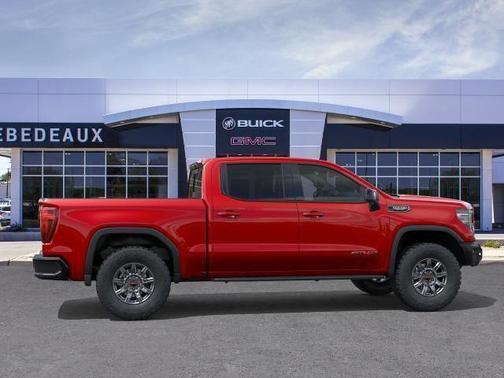 Volcanic Red Tintcoat 2026 GMC Sierra 1500 AT4X