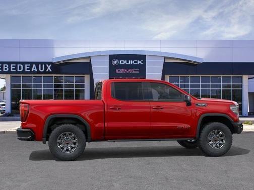 Volcanic Red Tintcoat 2026 GMC Sierra 1500 AT4X