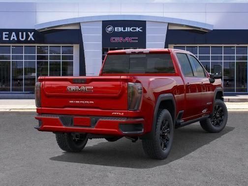 Volcanic Red Tintcoat 2026 GMC Sierra 3500 AT4