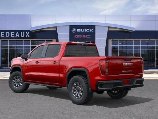 Volcanic Red Tintcoat 2026 GMC Sierra 1500 AT4X