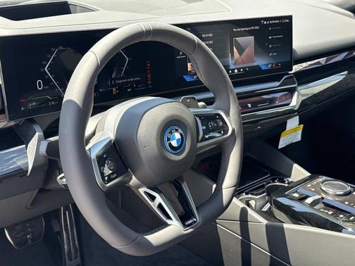 Mineral White Metallic 2026 BMW 550e xDrive