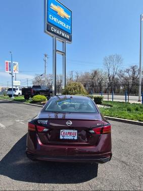 Garnet Pearl Metallic 2024 Nissan Altima 2.5 SV