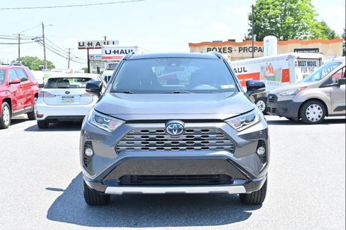 Blizzard Pearl/Midnight Black Metallic 2021 Toyota RAV4 Hybrid SE
