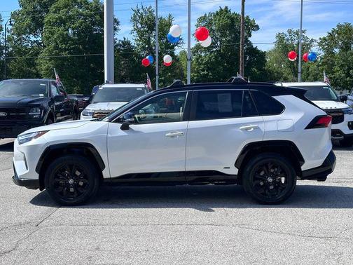 Wind Chill Pearl/Midnight Black Metallic 2024 Toyota RAV4 Hybrid SE