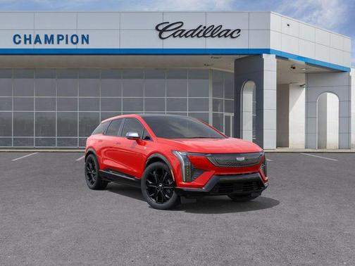 Orange 2026 Cadillac OPTIQ Sport