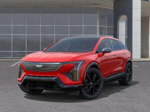 Orange 2026 Cadillac OPTIQ Sport