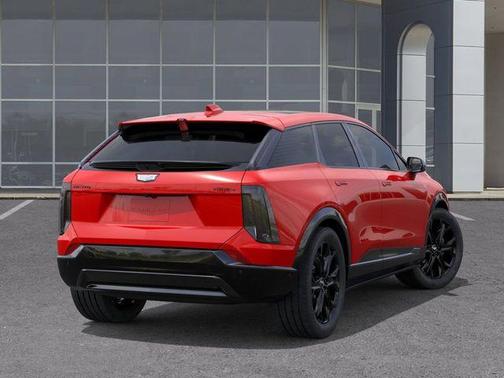 Orange 2026 Cadillac OPTIQ Sport